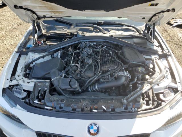 WBA4Z7C54KEF54977 - 2019 BMW 440XI WHITE photo 11