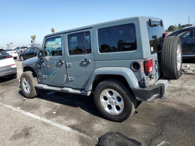 1C4HJWEG9EL224396 - 2014 JEEP WRANGLER U SAHARA GRAY photo 2