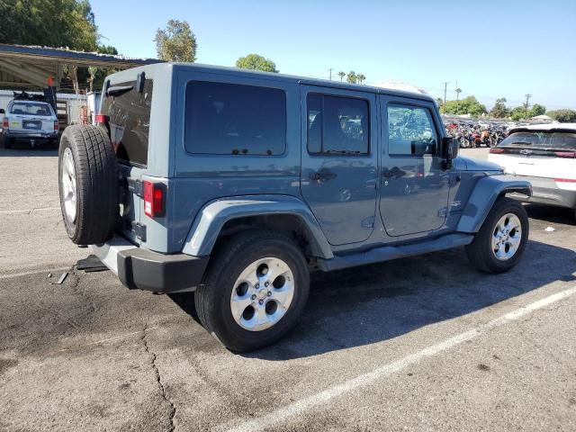 1C4HJWEG9EL224396 - 2014 JEEP WRANGLER U SAHARA GRAY photo 3