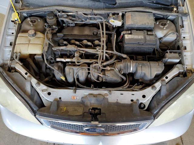 1FAFP34N15W145894 - 2005 FORD FOCUS ZX4 SILVER photo 11