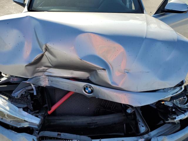 WBA8B9G5XJNV00090 - 2018 BMW 330 I ვერცხლისფერი ფოტო 11