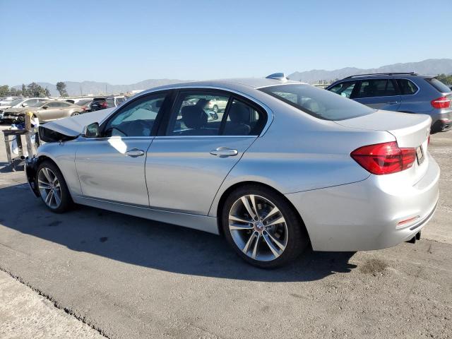 WBA8B9G5XJNV00090 - 2018 BMW 330 I SILVER photo 2