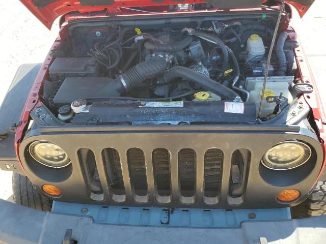 1J4BA5H13BL570019 - 2011 JEEP WRANGLER U SAHARA წითელი ფოტო 11
