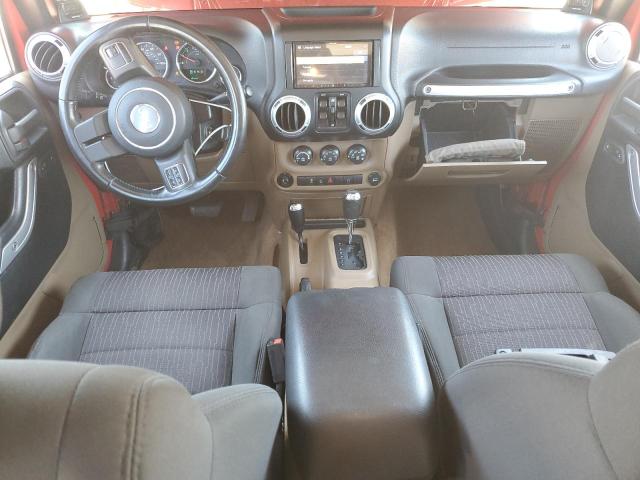 1J4BA5H13BL570019 - 2011 JEEP WRANGLER U SAHARA წითელი ფოტო 8