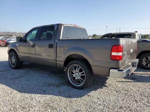 1FTPW12566KA92515 - 2006 FORD E-150 SUPERCREW GRAY photo 2