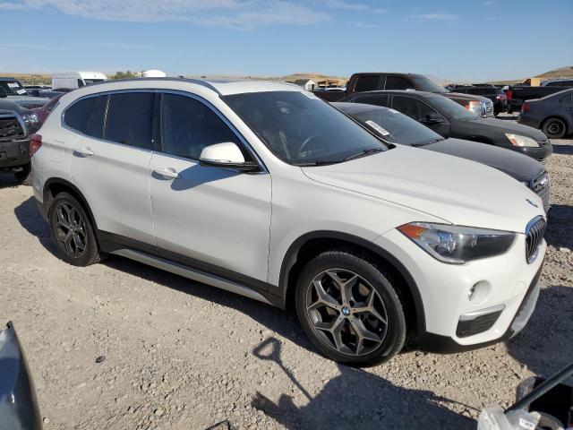 WBXHT3C56K5L90260 - 2019 BMW X1 XDRIVE28I WHITE photo 4