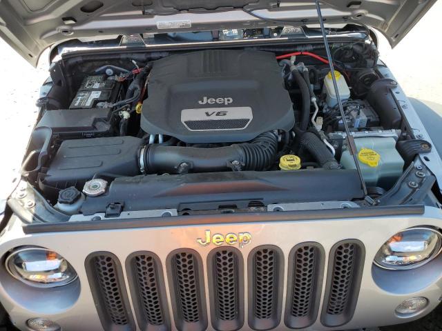 1C4HJWDG9GL161496 - 2016 JEEP WRANGLER SPORT SILVER photo 12