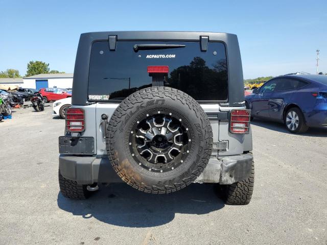 1C4HJWDG9GL161496 - 2016 JEEP WRANGLER SPORT SILVER photo 6