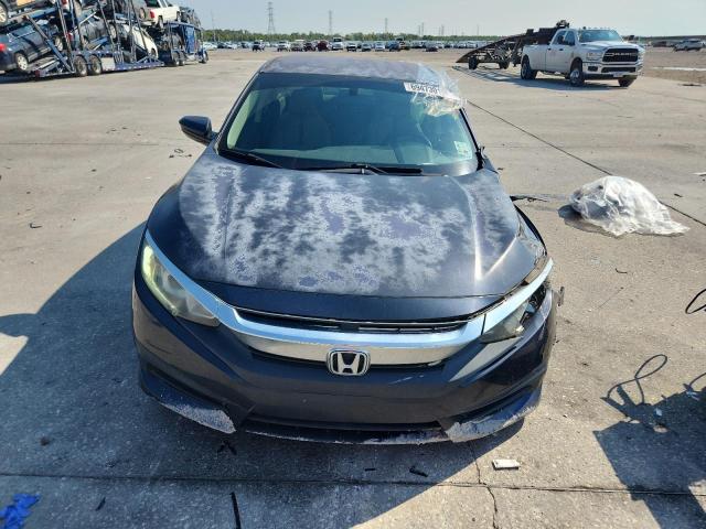 2HGFC2F56JH597976 - 2018 HONDA CIVIC LX Синий фото 5