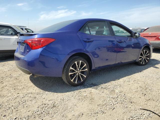 5YFBURHE3JP779306 - 2018 TOYOTA COROLLA L BLUE photo 3