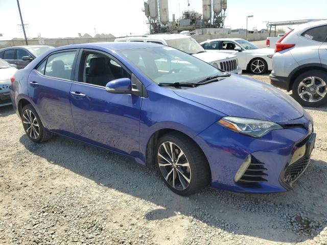 5YFBURHE3JP779306 - 2018 TOYOTA COROLLA L BLUE photo 4
