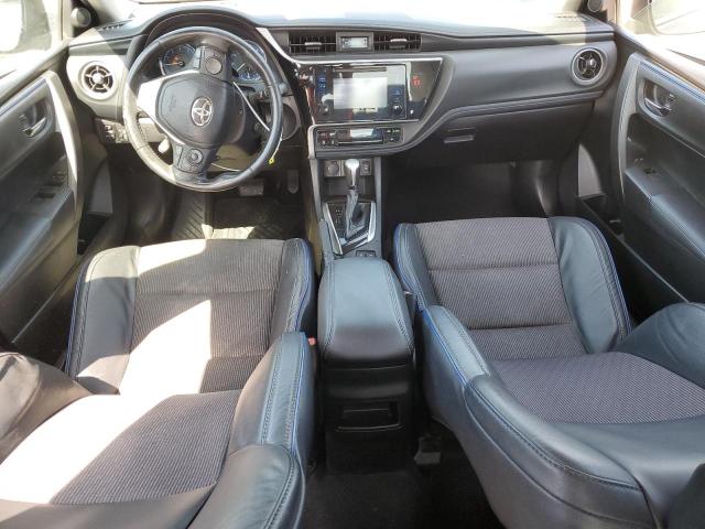 5YFBURHE3JP779306 - 2018 TOYOTA COROLLA L BLUE photo 8