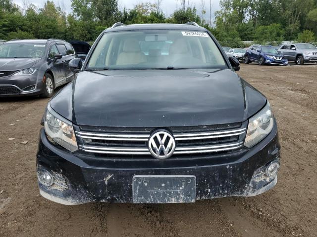 WVGAV7AX9CW535416 - 2012 VOLKSWAGEN TIGUAN S BLACK photo 5