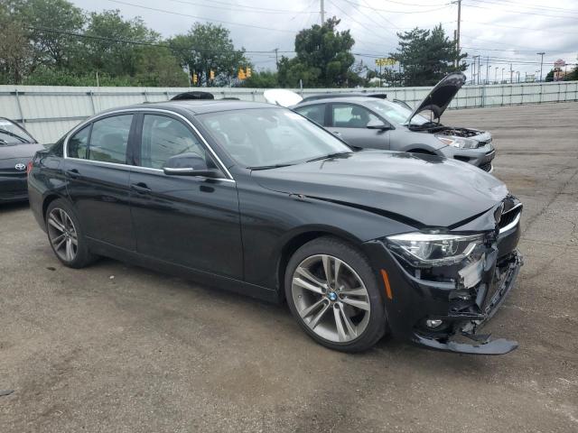 WBA8D9C58JA615701 - 2018 BMW 330 XI BLACK photo 4