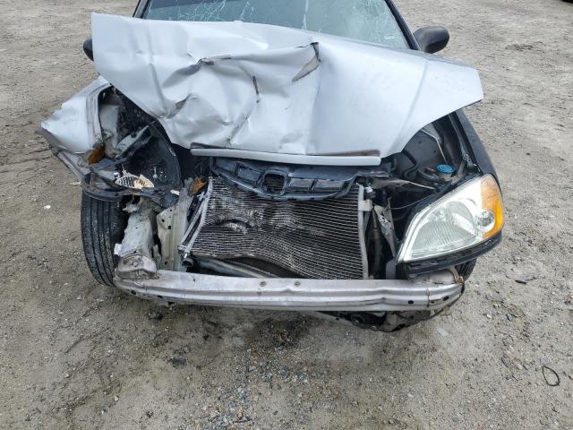 1HGEM22563L028369 - 2003 HONDA CIVIC LX SILVER photo 11