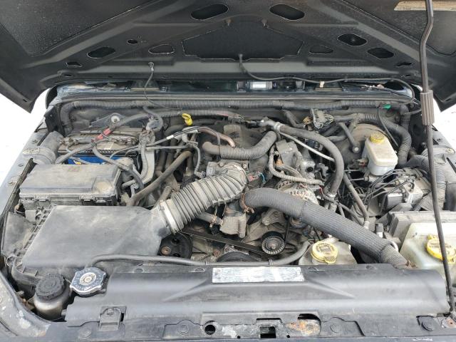 1J4AA2D15BL541346 - 2011 JEEP WRANGLER SPORT GREEN photo 12