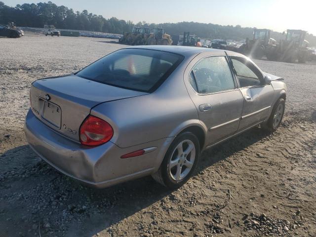 JN1CA31D11T828767 - 2001 NISSAN MAXIMA GXE TAN photo 3