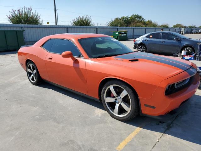 2B3LJ74W89H569576 - 2009 DODGE CHALLENGER SRT-8 ORANGE photo 4