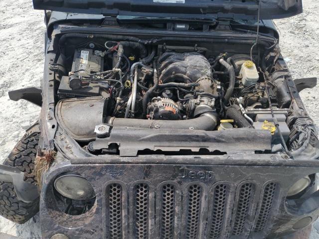 1C4HJWEG8CL263736 - 2012 JEEP WRANGLER U SAHARA Qara foto 11