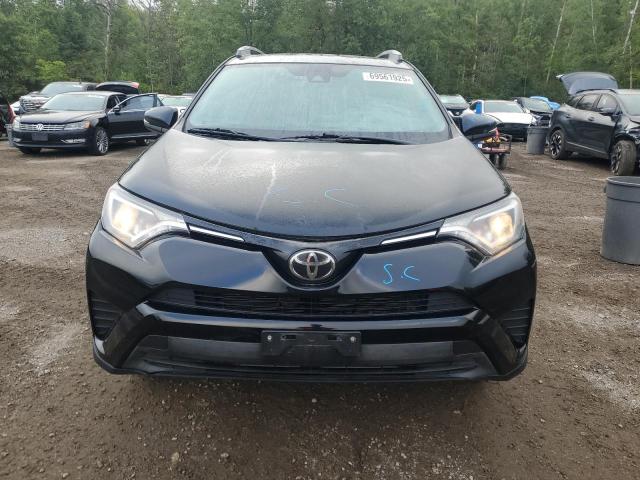 2T3BFREV3JW811711 - 2018 TOYOTA RAV4 LE Սև լուսանկար 5