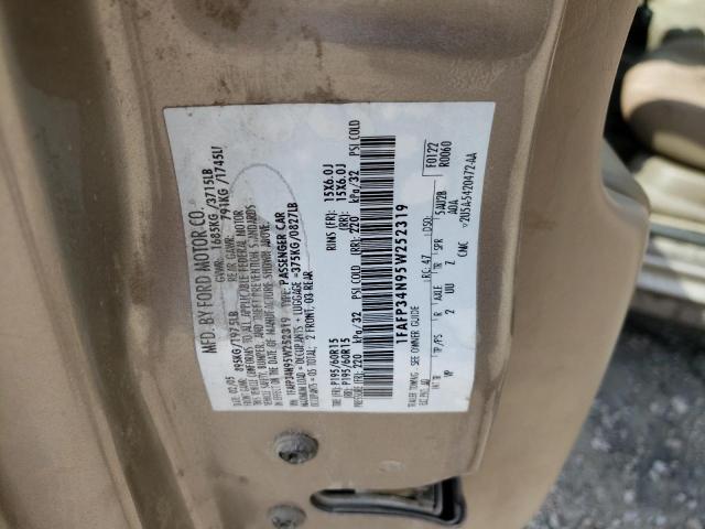 1FAFP34N95W252319 - 2005 FORD FOCUS ZX4 GOLD photo 12