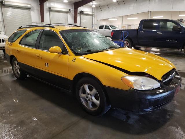 1FAFP58U5YG172382 - 2000 FORD TAURUS SE YELLOW photo 4