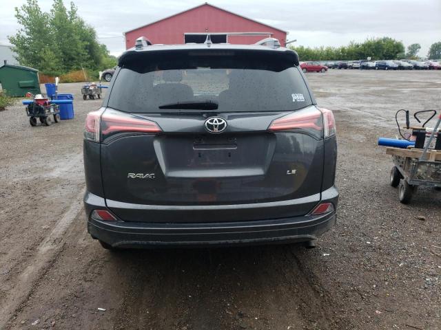 2T3ZFREV7JW457416 - 2018 TOYOTA RAV4 LE GRAY photo 6