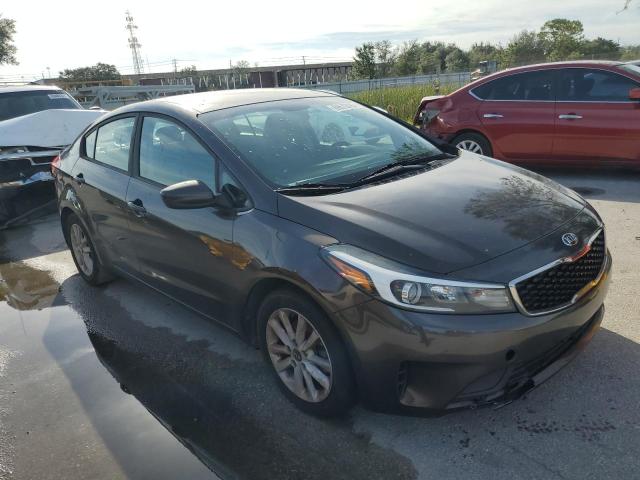 3KPFL4A72HE016059 - 2017 KIA FORTE LX BROWN photo 4