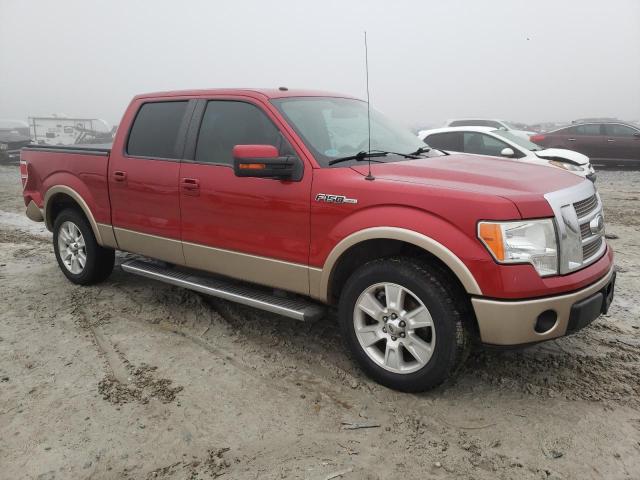 1FTFW1CFXBFA31027 - 2011 FORD F-150 LARI SUPERCREW RED photo 4