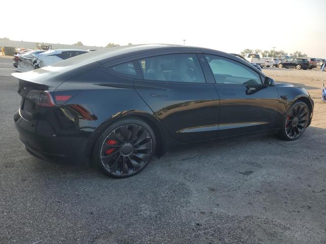 5YJ3E1EC2NF274820 - 2022 TESLA MODEL 3 Schwarz Foto 3