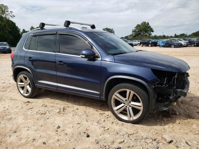 WVGAV7AX3FW009805 - 2015 VOLKSWAGEN TIGUAN S BLUE photo 4