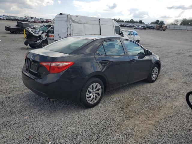 2T1BURHE6JC056291 - 2018 TOYOTA COROLLA L Schwarz Foto 3