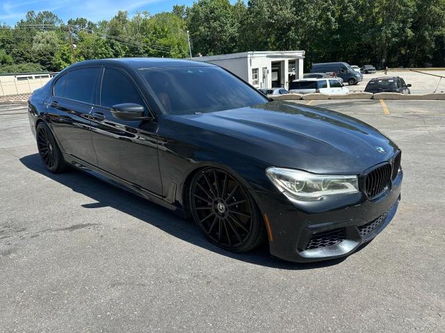 WBA7F0C54GGM20864 - 2016 BMW 750 I BLACK photo 4