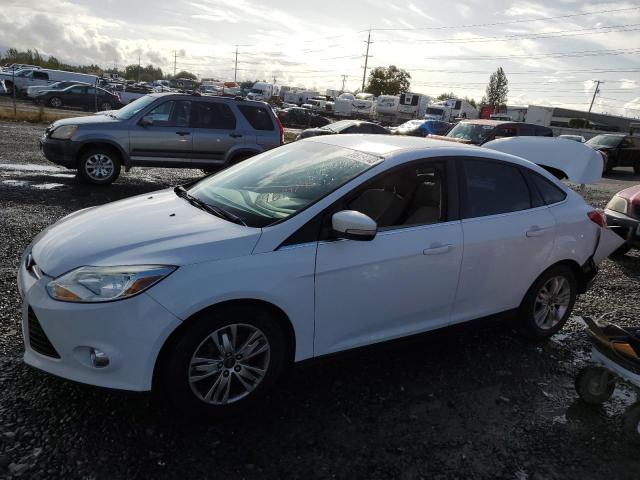 1FAHP3H28CL388044 - 2012 FORD FOCUS SEL WHITE photo 1