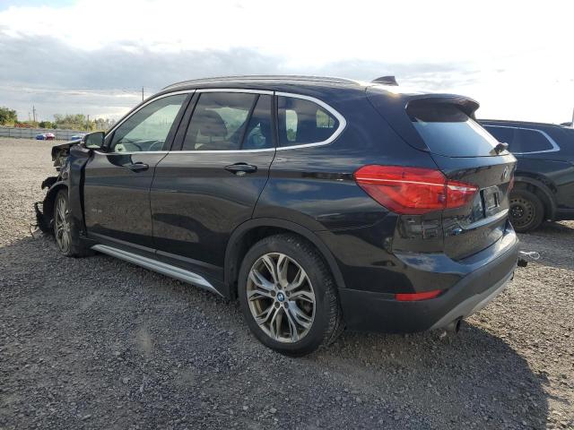 WBXHT3C39H5F82010 - 2017 BMW X1 XDRIVE28I BLACK photo 2