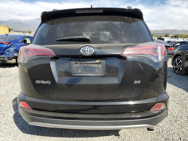 2T3NFREV5HW390419 - 2017 TOYOTA RAV4 SE BLACK photo 6