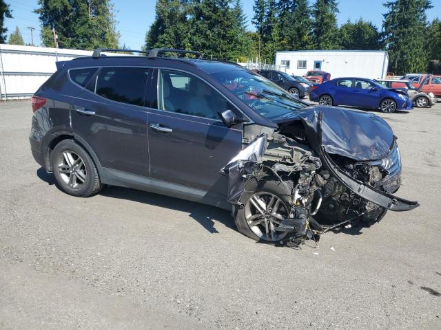 5XYZU3LB9HG417178 - 2017 HYUNDAI SANTA FE S GRAY photo 4