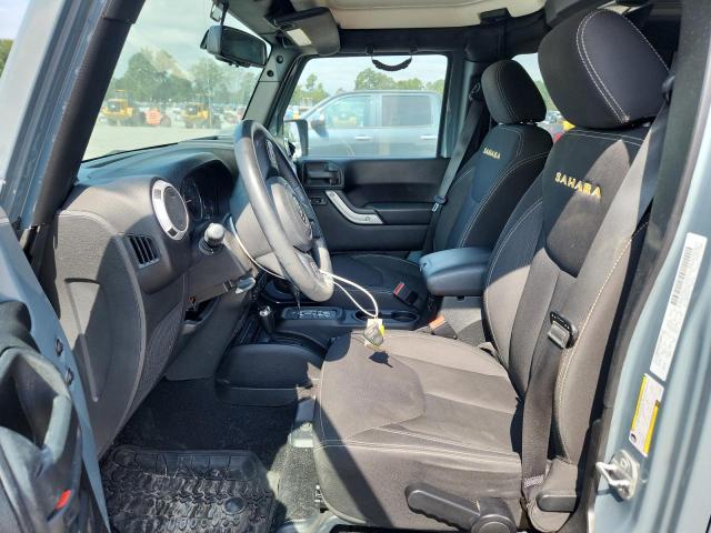 1C4BJWEG2EL292951 - 2014 JEEP WRANGLER U SAHARA GRAY photo 7