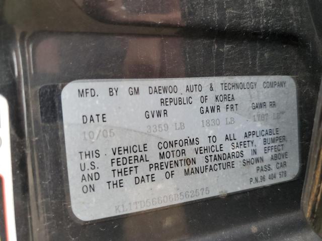 KL1TD56606B562575 - 2006 CHEVROLET AVEO BASE Czarny zdjęcie 12