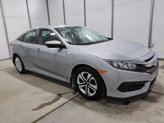 2HGFC2F53JH601174 - 2018 HONDA CIVIC LX Gümüş fotoğraf 4