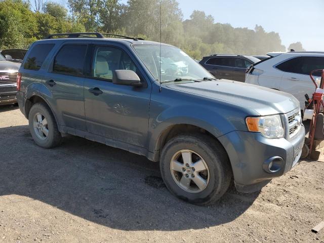 1FMCU0D73AKC63867 - 2010 FORD ESCAPE XLT BLUE photo 4