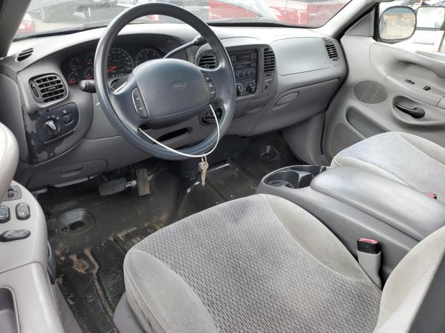 2FTZF17WXWCA80401 - 1998 FORD F150 Черный фото 8