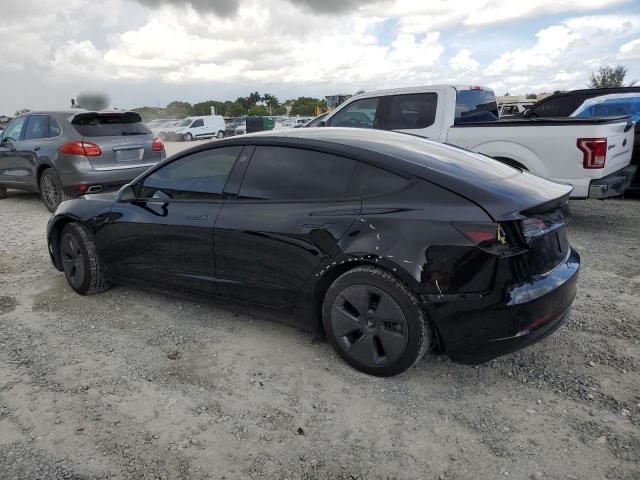 5YJ3E1EA7PF424129 - 2023 TESLA MODEL 3 BLACK photo 2