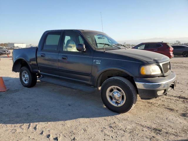 1FTRW08L61KE94052 - 2001 FORD F150 SUPER BLUE photo 4