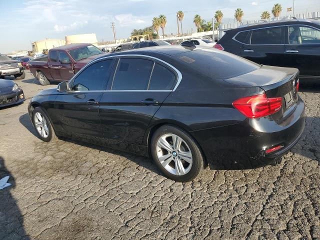 WBA8B9G51JNU97905 - 2018 BMW 330 I BLACK photo 2