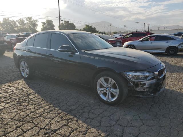 WBA8B9G51JNU97905 - 2018 BMW 330 I BLACK photo 4