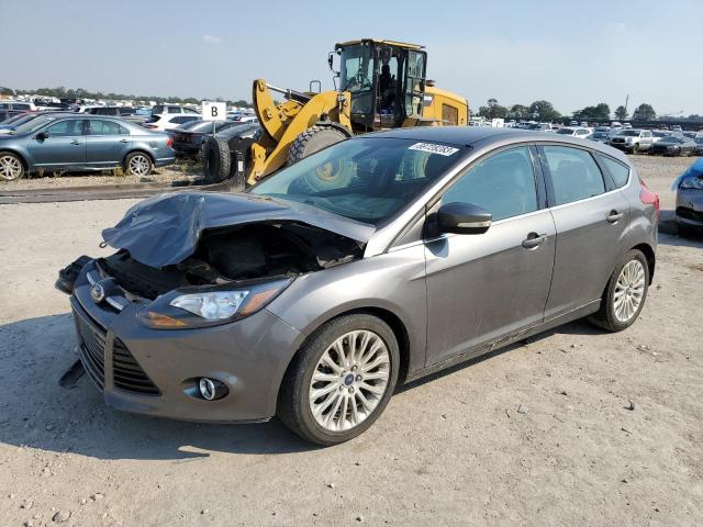 1FAHP3N24CL447563 - 2012 FORD FOCUS TITANIUM GRAY photo 1