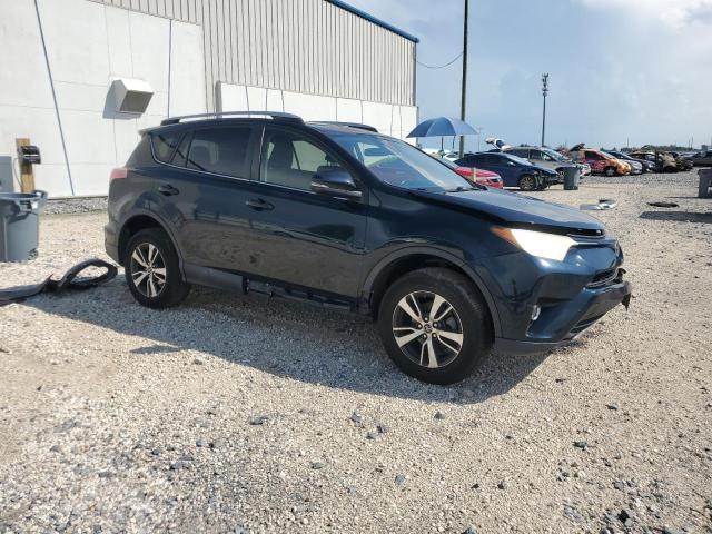 JTMWFREV4HD093644 - 2017 TOYOTA RAV4 XLE ლურჯი ფოტო 4