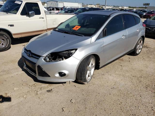 1FAHP3N20CL347394 - 2012 FORD FOCUS TITANIUM SILVER photo 1