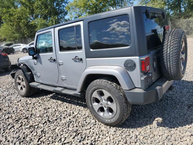 1C4BJWEG4GL239574 - 2016 JEEP WRANGLER U SAHARA SILVER photo 2